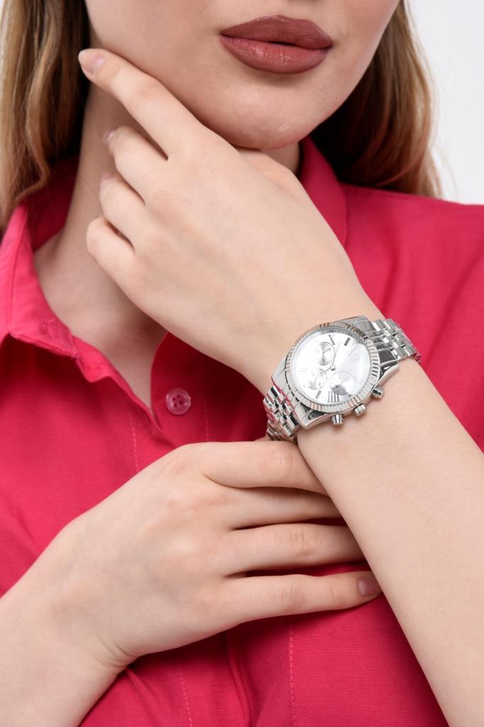 White Dial Silver Women's Wristwatch with Roman Numeral Case Detail