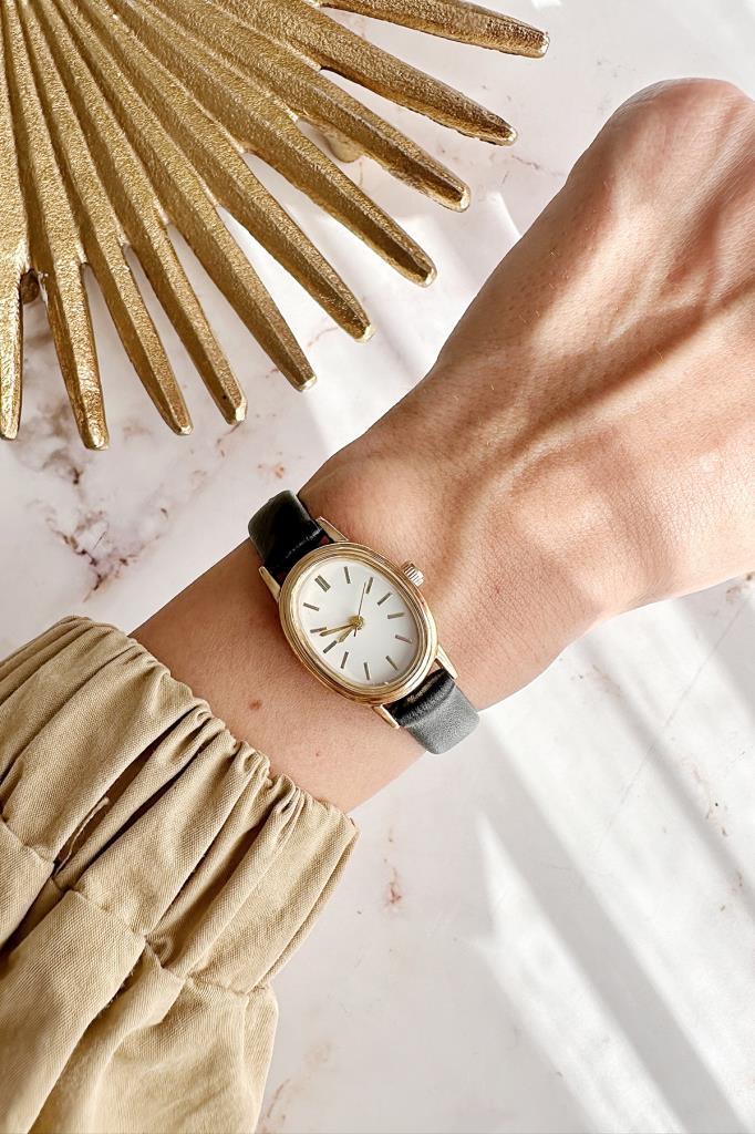 Iris Gold Case Black Strap Women's Wristwatch 