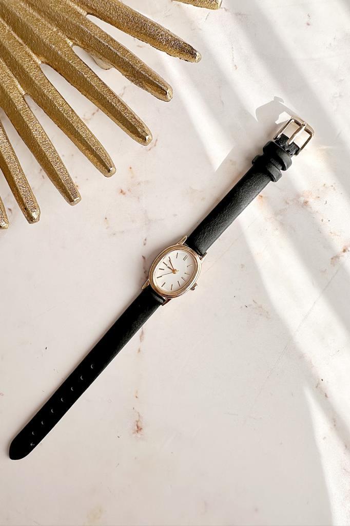 Iris Gold Case Black Strap Women's Wristwatch 